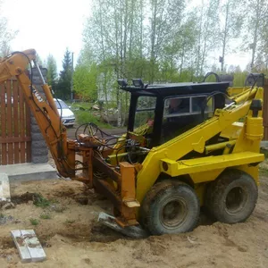 Мини экскаватор в Фаниполе. Планировка участка,  копка ям,  траншей